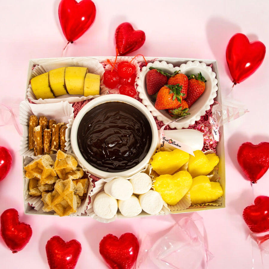 box with a bowl of Belgian chocolate dip with fruits and treats for Valentine's day Serves 2-4 