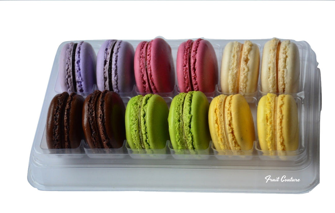 Gluten-free French macarons in assorted colours, perfect for gifting or enjoying with coffee or tea – available for delivery in Ottawa.